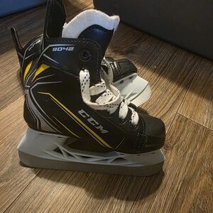Ccm Black and Yellow Kids Ice Skates